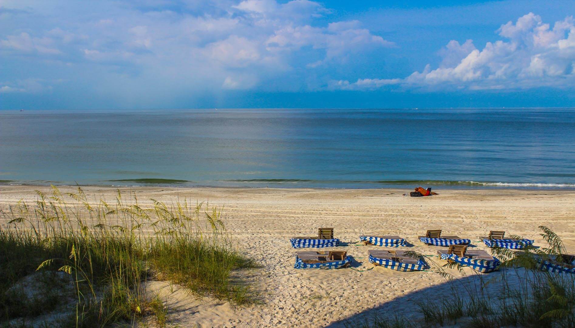 A peaceful view of the beach at VRI's Island Gulf Resort in Madeira Beach, Florida.